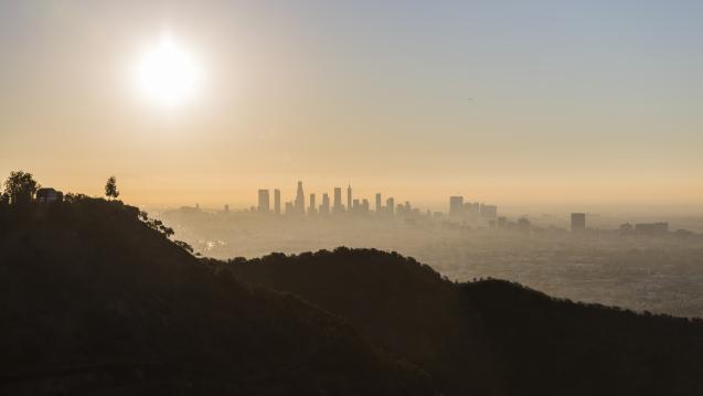 Skyline of LA with warm sun nearing sunset