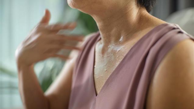 Person who is sweating in hot weather