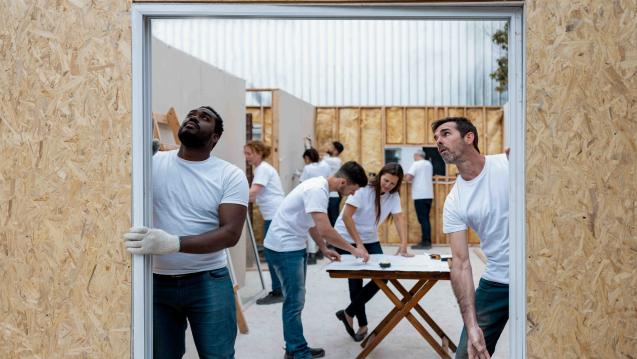 Volunteers rebuilding a home