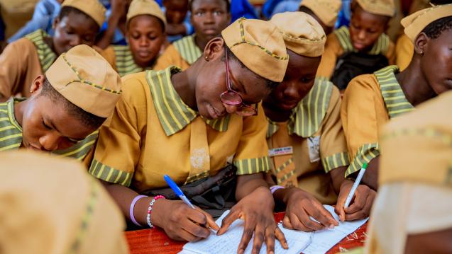 Women writing and studying in Nigeria