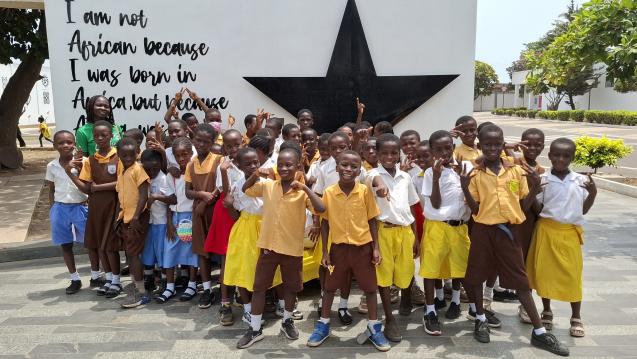 Second Graders in United Way Ghana exchange project smile for a group photo.