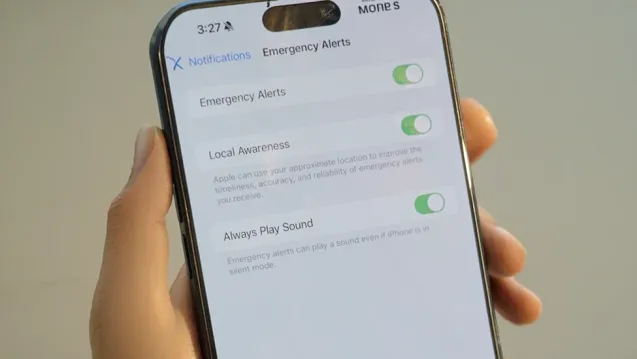 A phone screen showing emergency alerts toggle buttons