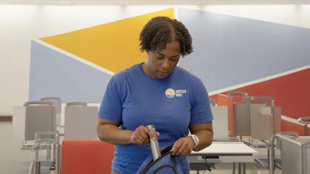 A woman packing her go bag