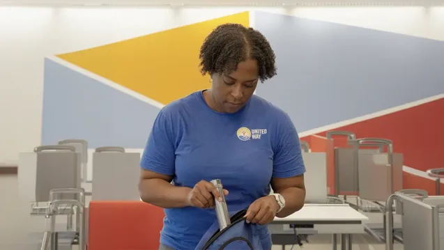 A woman packing her go bag