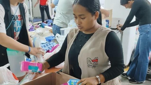 Volunteers Sorting Hygiene Items