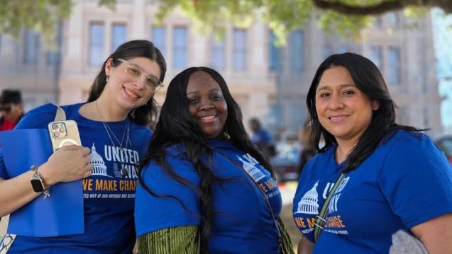 Three recipients of the scholarships smiling in front of the Texas Capitol in Austin