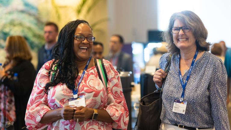 Two women enjoying a United Way conference