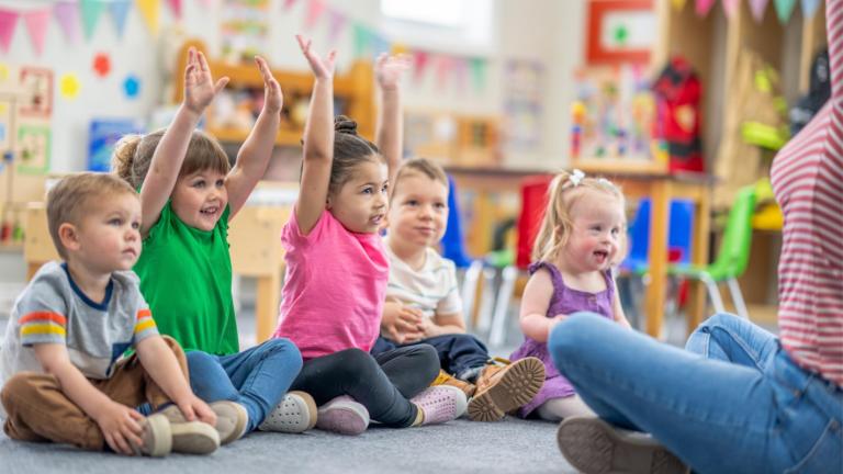 Excited toddlers in a classroom