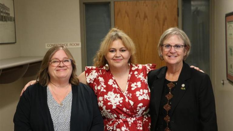 3 women posed for a picture