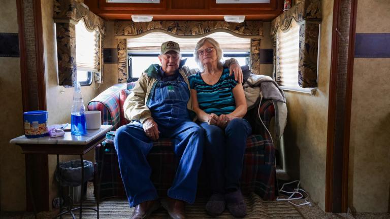 Community members in a temporary home