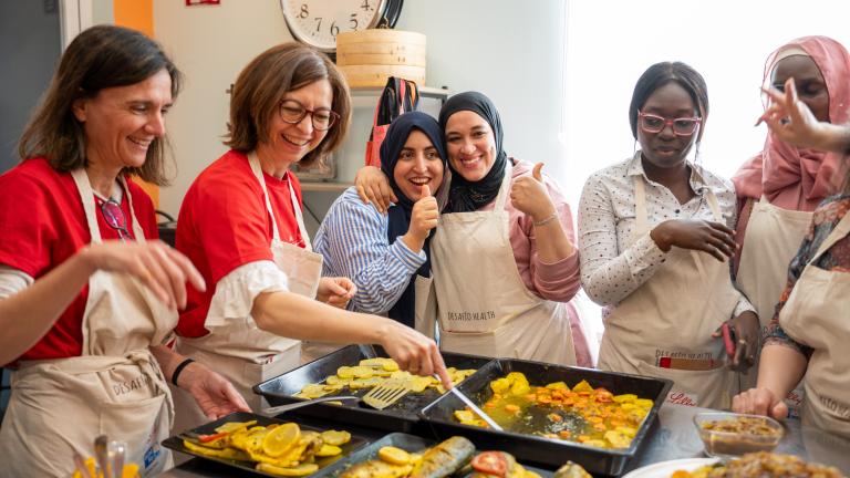Women cooking healthy foods together