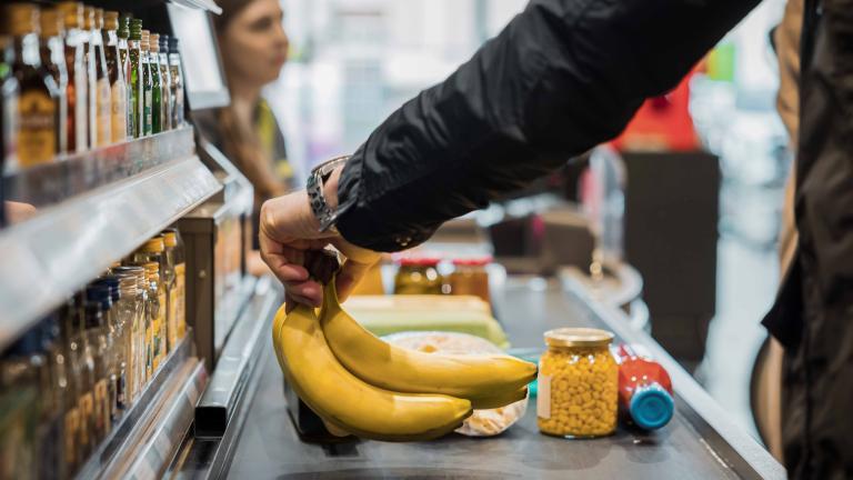 Healthy foods being purchased at a grocery store