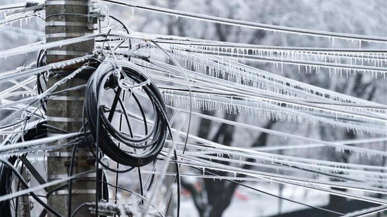 Power lines weighed down by snow and ice