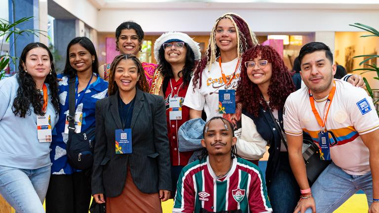 Young people attending the GOYN convening smiling for a group photo
