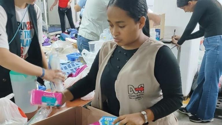 Volunteers Sorting Hygiene Items