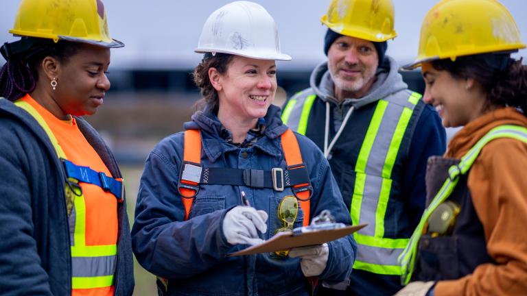 Construction workers in a small group