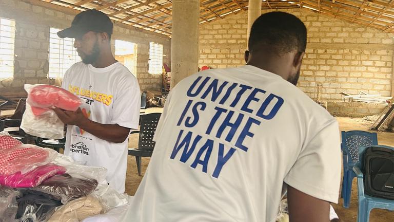 United Way workers sort donations to help Ghana flood recovery