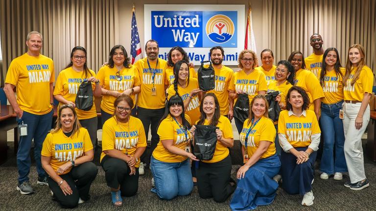 United Way Miami staff smiling in a group photo