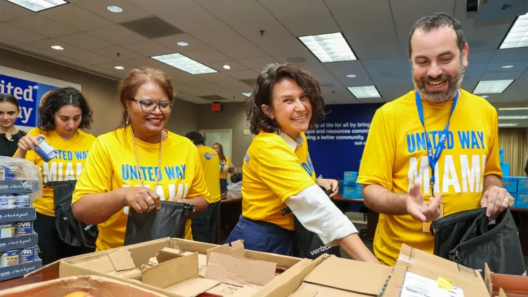United Way Miami staff assemble hurricane emergency kits