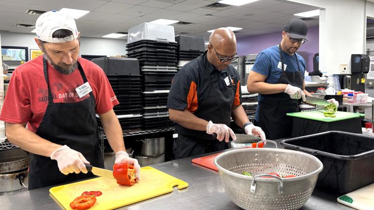 Volunteers prepping food