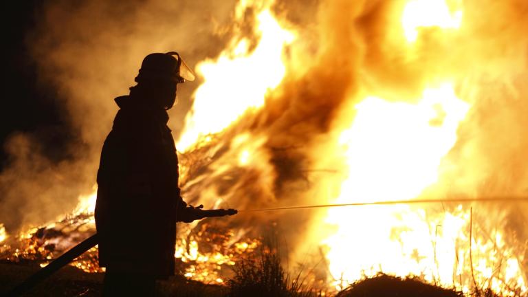 Fireman battling a blaze