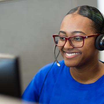 211 Operator in blue shirt