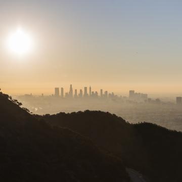 Skyline of LA with warm sun nearing sunset