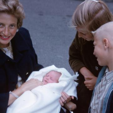 Mary Gates holds Bill Gates as a baby