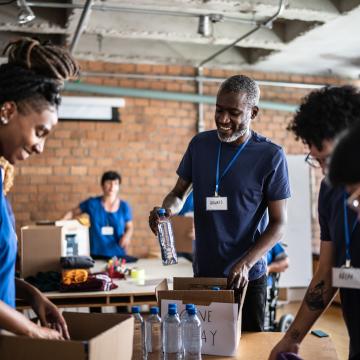 Volunteers sorting food