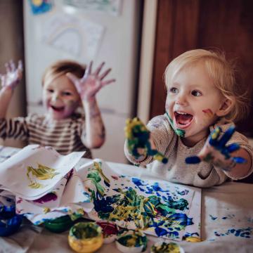 Small children finger painting