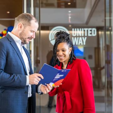 Event attendees engaging in the lobby of the Mary M. Gates Learning Center