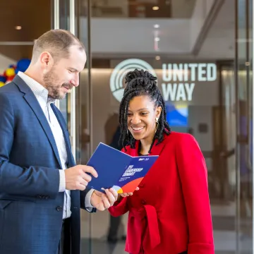 Event attendees engaging in the lobby of the Mary M. Gates Learning Center
