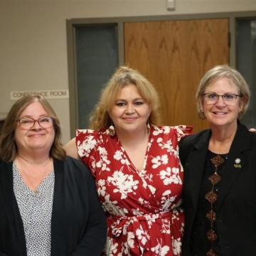 3 women posed for a picture
