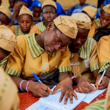 Women writing and studying in Nigeria