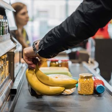Healthy foods being purchased at a grocery store
