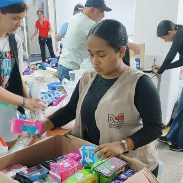 Volunteers Sorting Hygiene Items