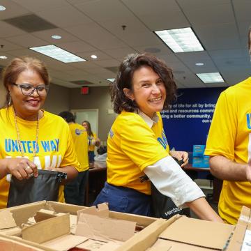 United Way Miami staff assemble hurricane emergency kits